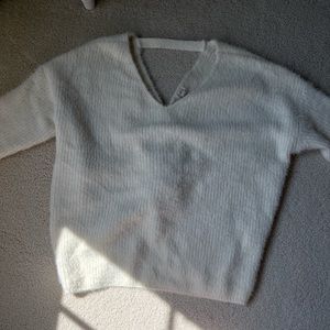cream back crossed-sweater